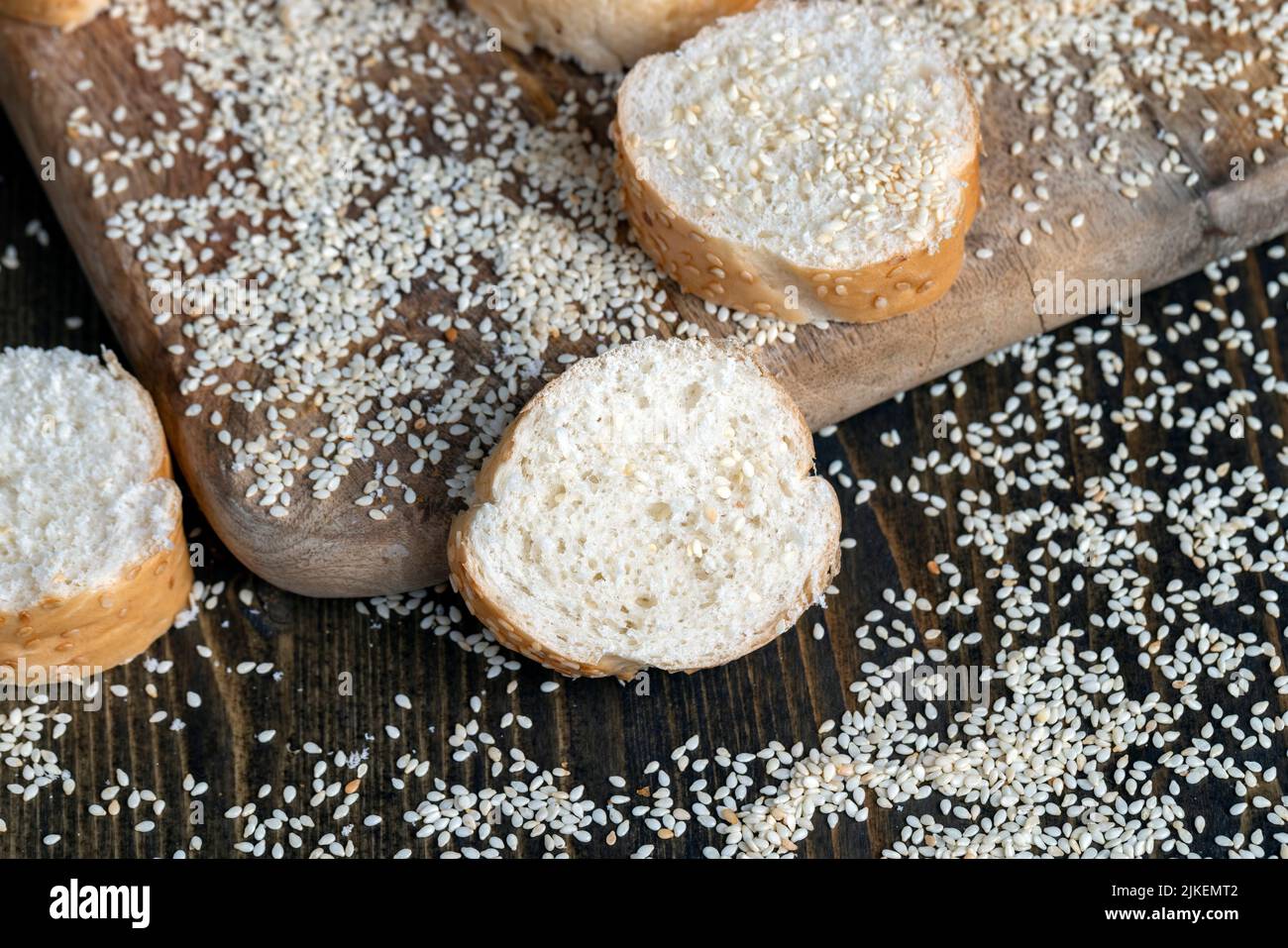 wheat grain baguette sprinkled with sesame seeds, wheat flour baguette ...