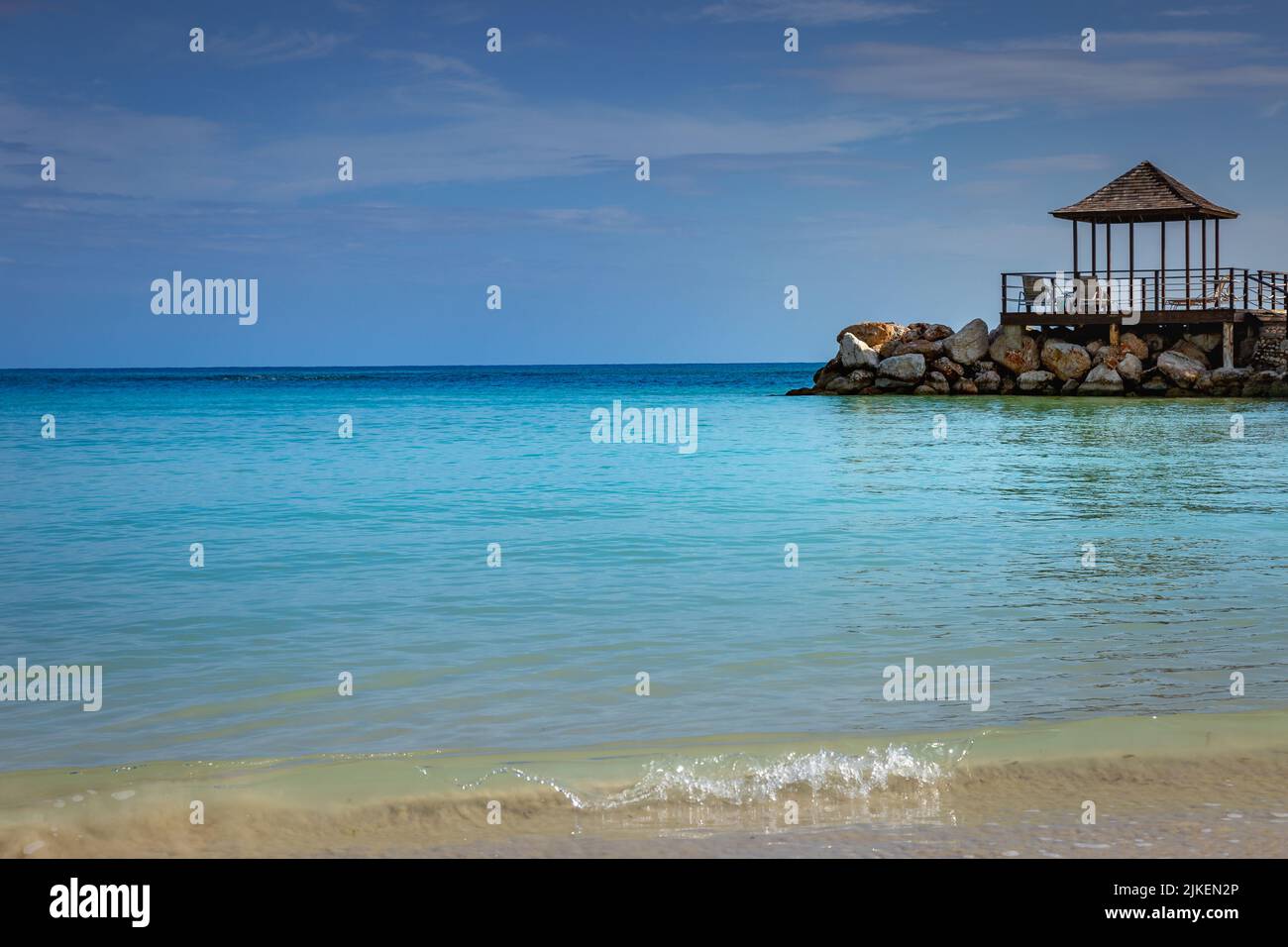 Tropical paradise: caribbean beach with pier and gazebo, Montego Bay ...