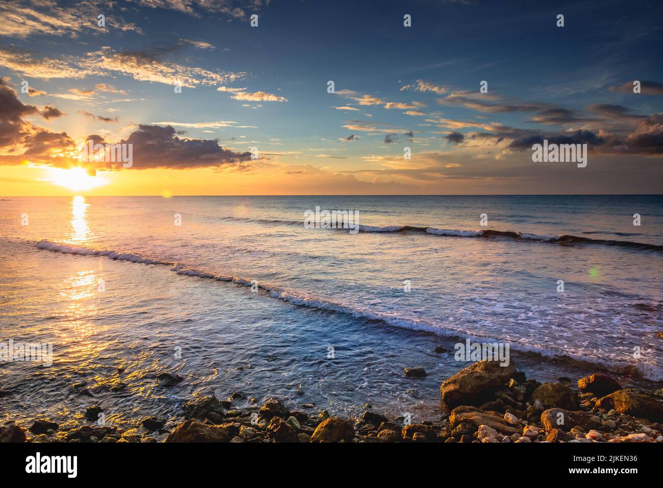 Tropical paradise: caribbean beach at golden sunset, Montego Bay ...
