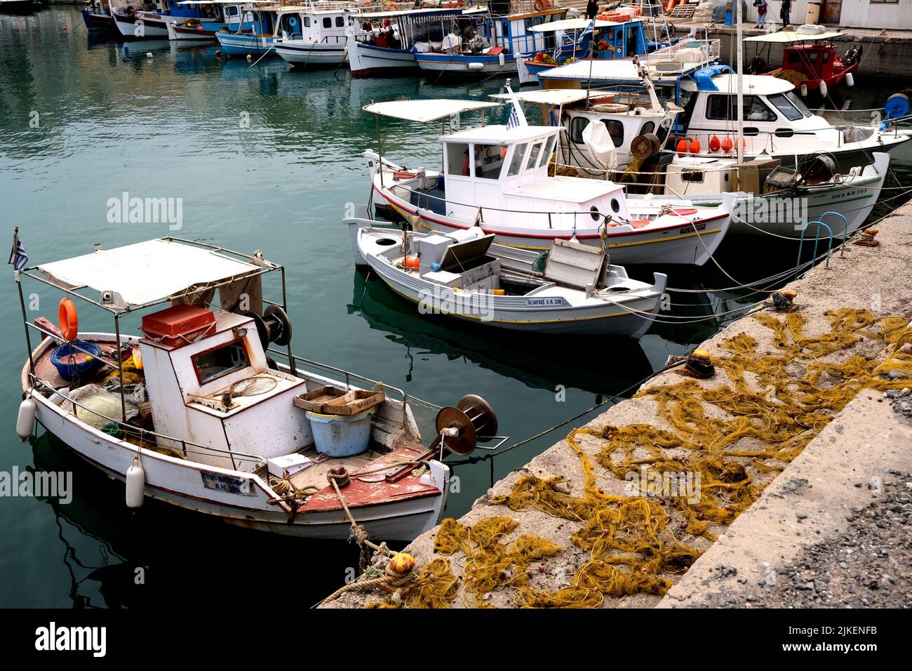 Fishing boats moored in Heraklion harbour in Crete Greece Stock Photo
