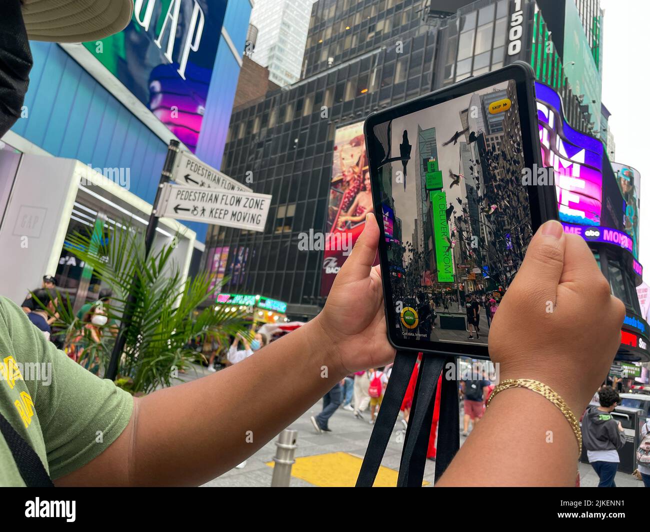 New York, United States. 01st Aug, 2022. People are seen experiencing a new Augmented reality (AR) experience, a large-scale app-based experience that launched today to digitally transform the Times Square, New York City into a playground, On August 1, 2022. (Photo by Ryan Rahman/Pacific Press) Credit: Pacific Press Media Production Corp./Alamy Live News Stock Photo