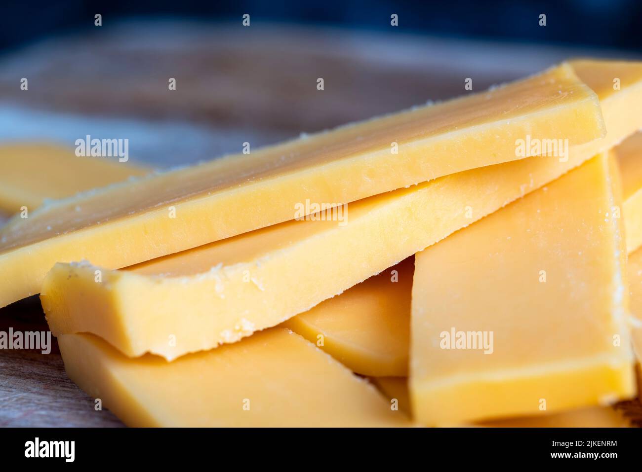 Sliced yellow cheese made from cow's milk, solid quality yellow cheese