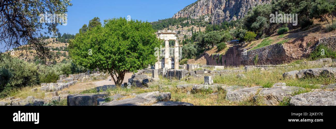Delphi Greece, Archaeological Site. Ancient Greek considered Delfi as the centre of the world. Temple stone and columns ruins Stock Photo
