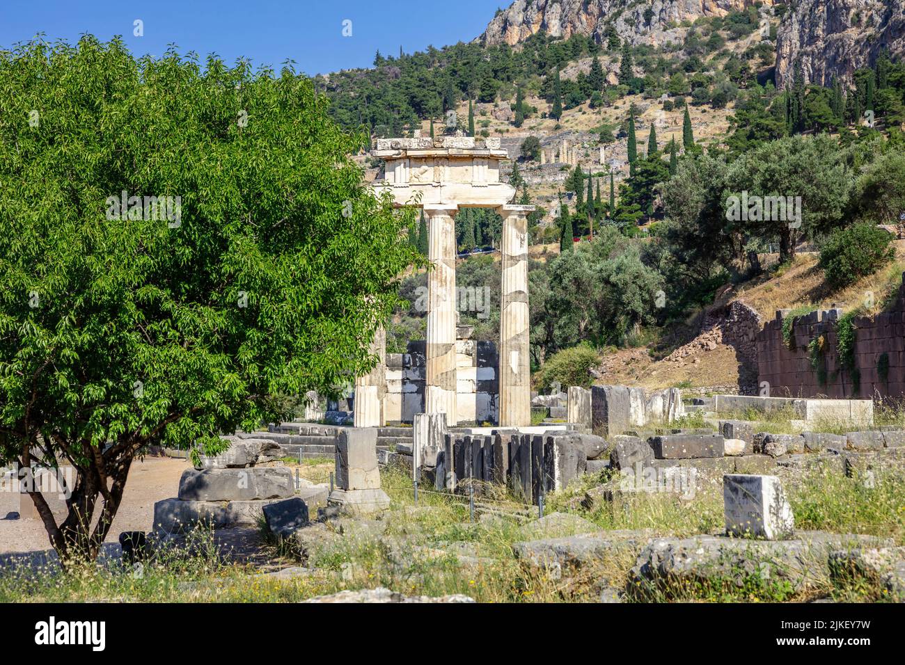 Delphi Greece, Archaeological Site. Ancient Greek considered Delfi as the centre of the world. Temple stone and columns ruins Stock Photo