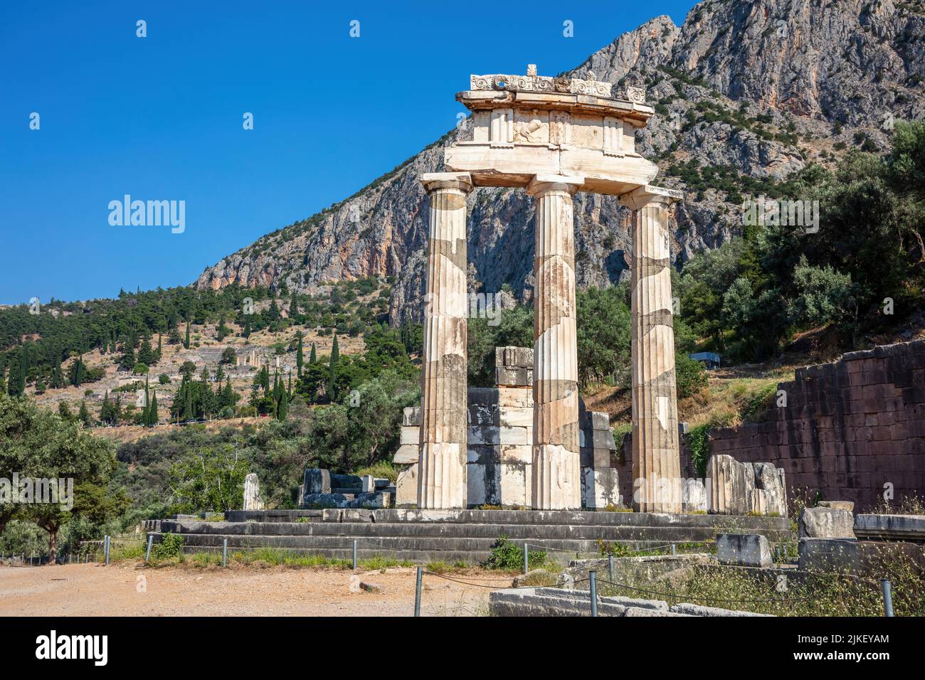 Delphi Greece, Archaeological Site. Ancient Greek considered Delfi as the centre of the world. Temple stone and columns ruins Stock Photo