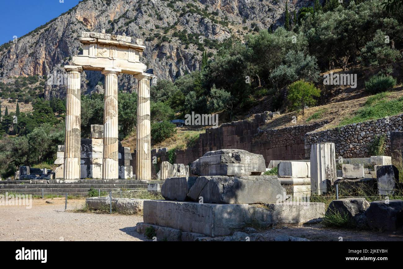 Delphi Greece, Archaeological Site. Ancient Greek considered Delfi as the centre of the world. Temple stone and columns ruins Stock Photo