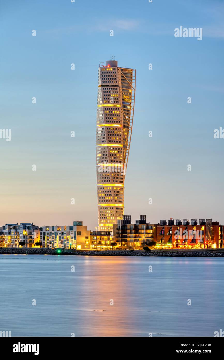 The iconic Turning Torso in in Malmo, Sweden, after sunset Stock Photo