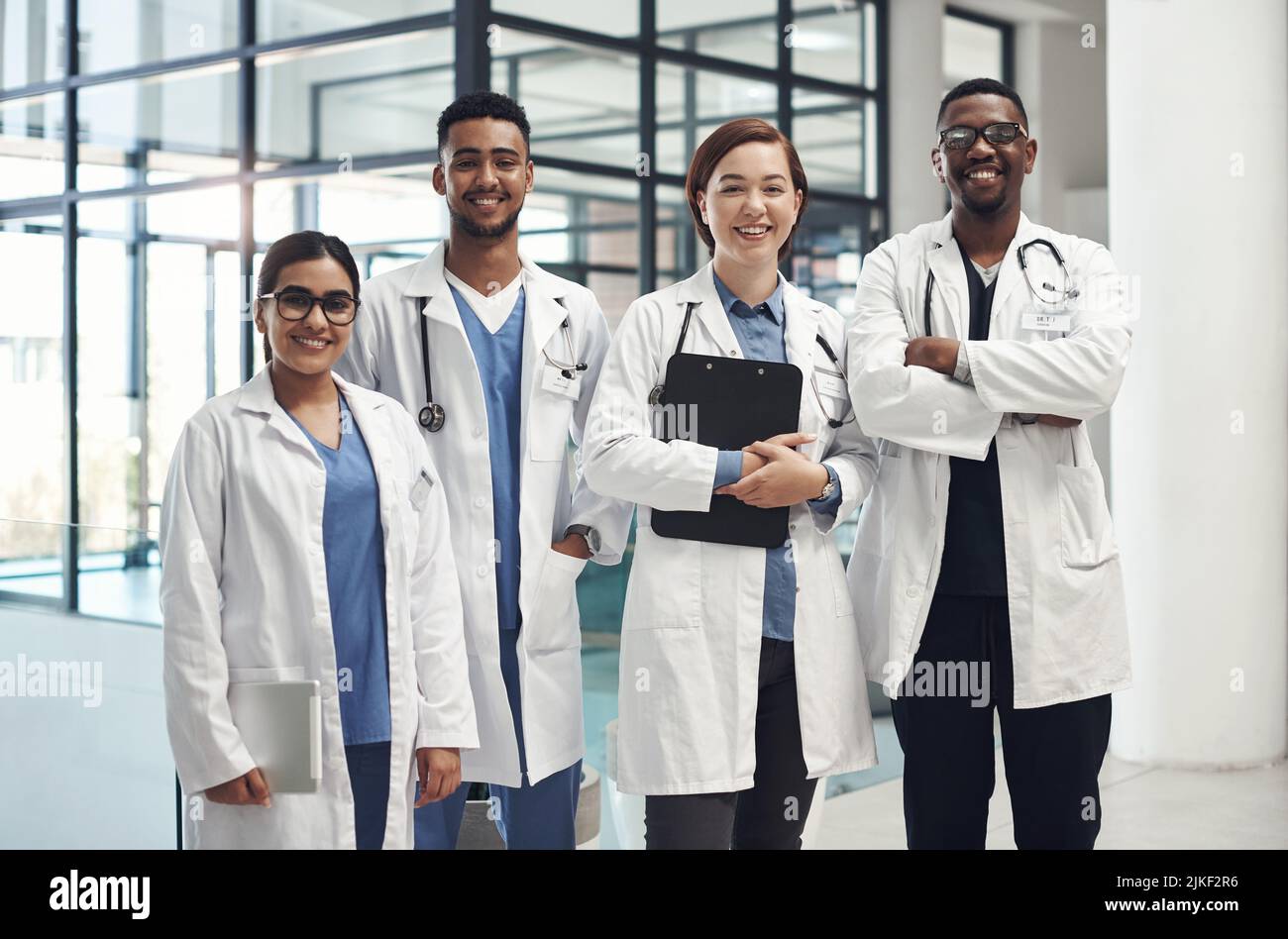A dedicated team of experts. a group of medical staff together at work. Stock Photo