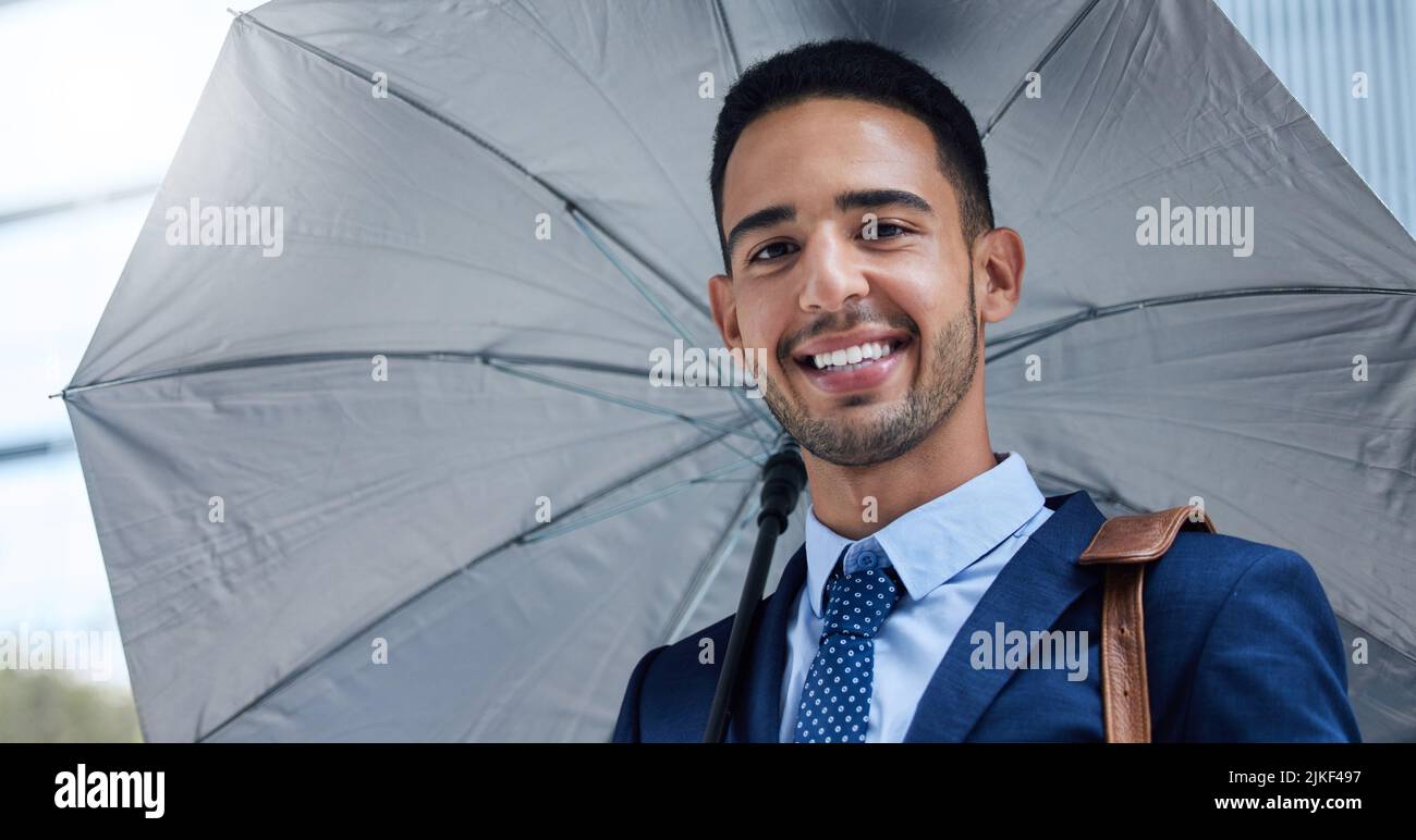 You cant rain on my parade. Cropped portrait of a handsome young