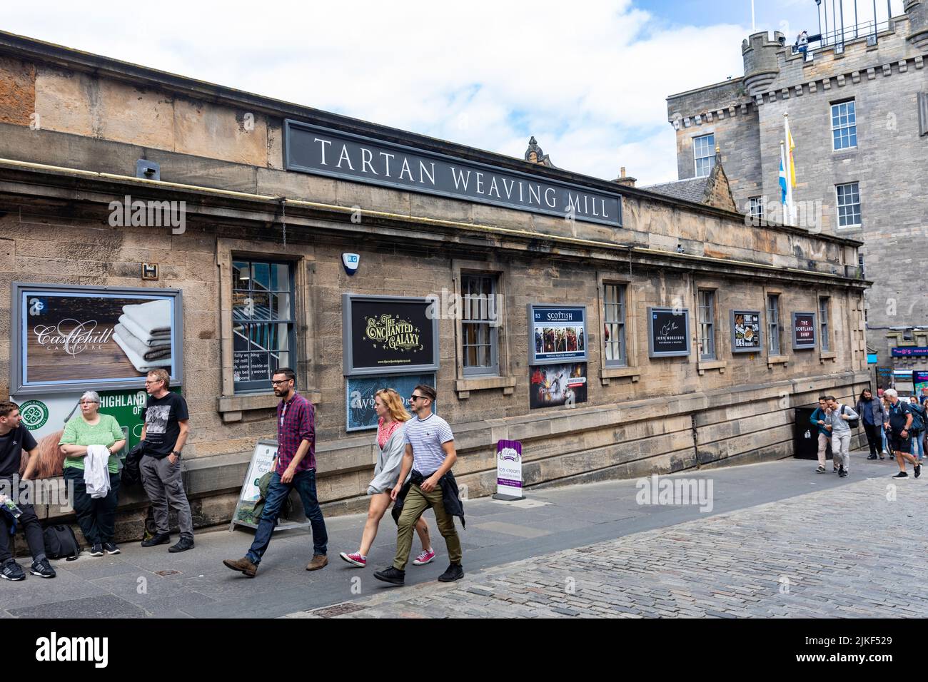 Edinburgh Royal Mile, exterior of Tartan Weaving Mill and exhibition centre selling Scottish clothes for men and women,Scotland,UK summer 2022 Stock Photo