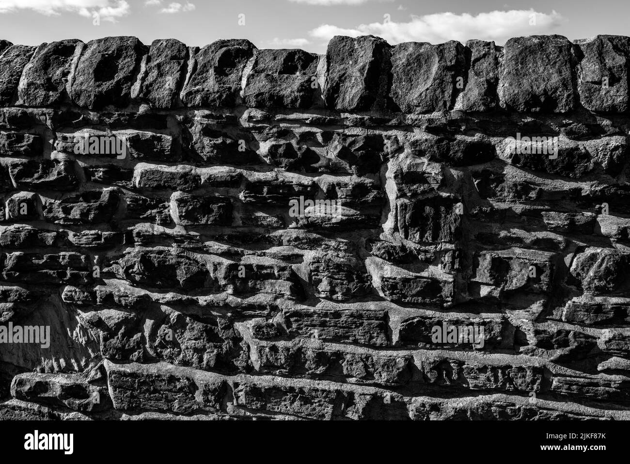 Old stone wall detail Stock Photo