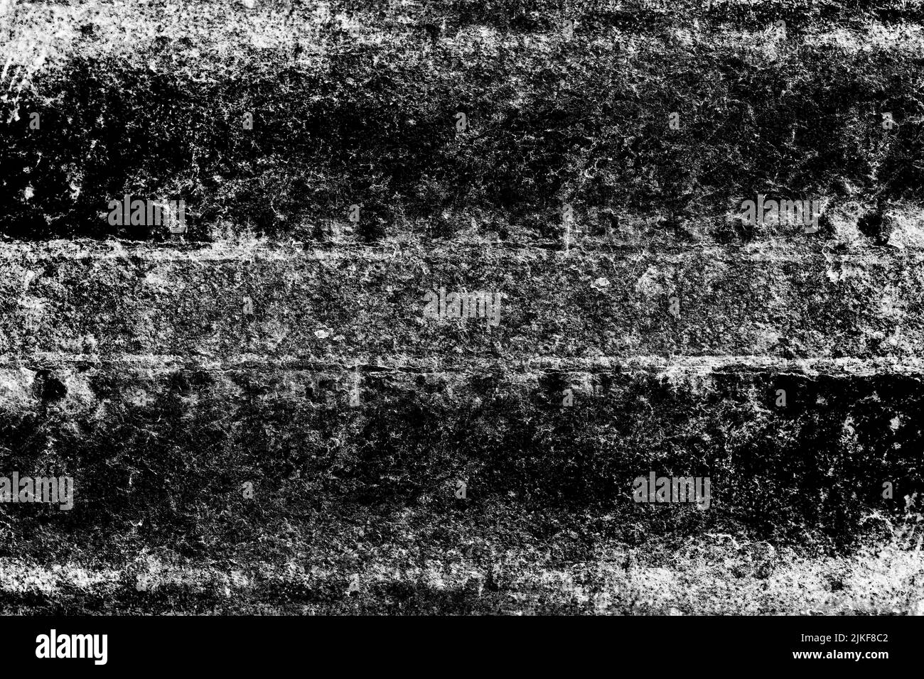Rugged monochromatic old metal surface with grunge texture for background Stock Photo