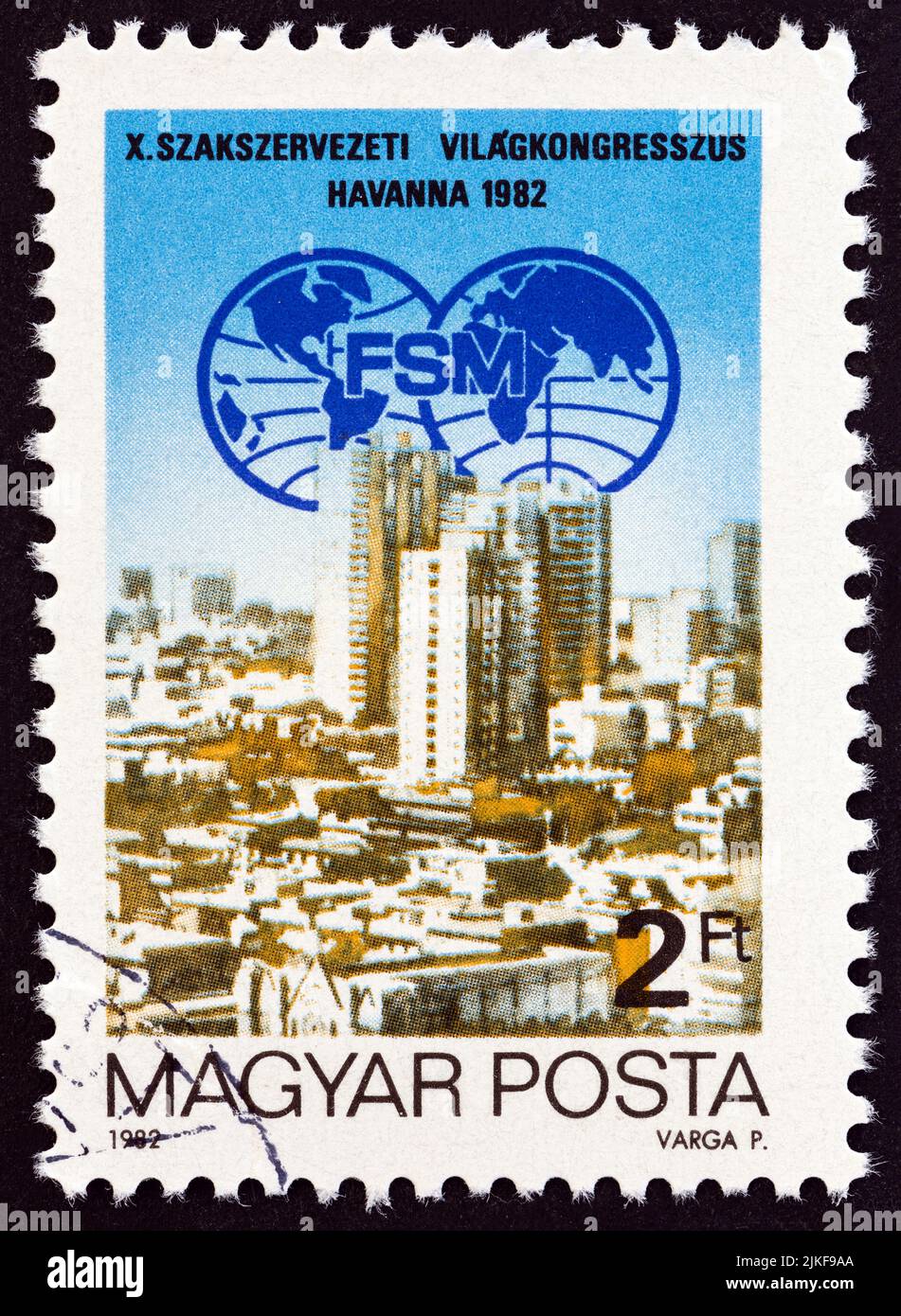 HUNGARY - CIRCA 1982: A stamp printed in Hungary issued for the 10th World Trade Unions Federation Congress, Havana shows congress emblem and Havana. Stock Photo