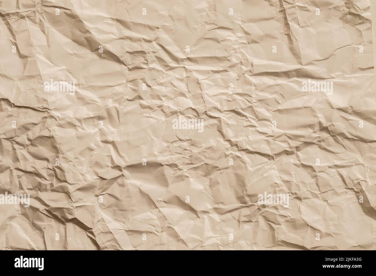 beige crumpled paper sheet creased effect layer Stock Photo