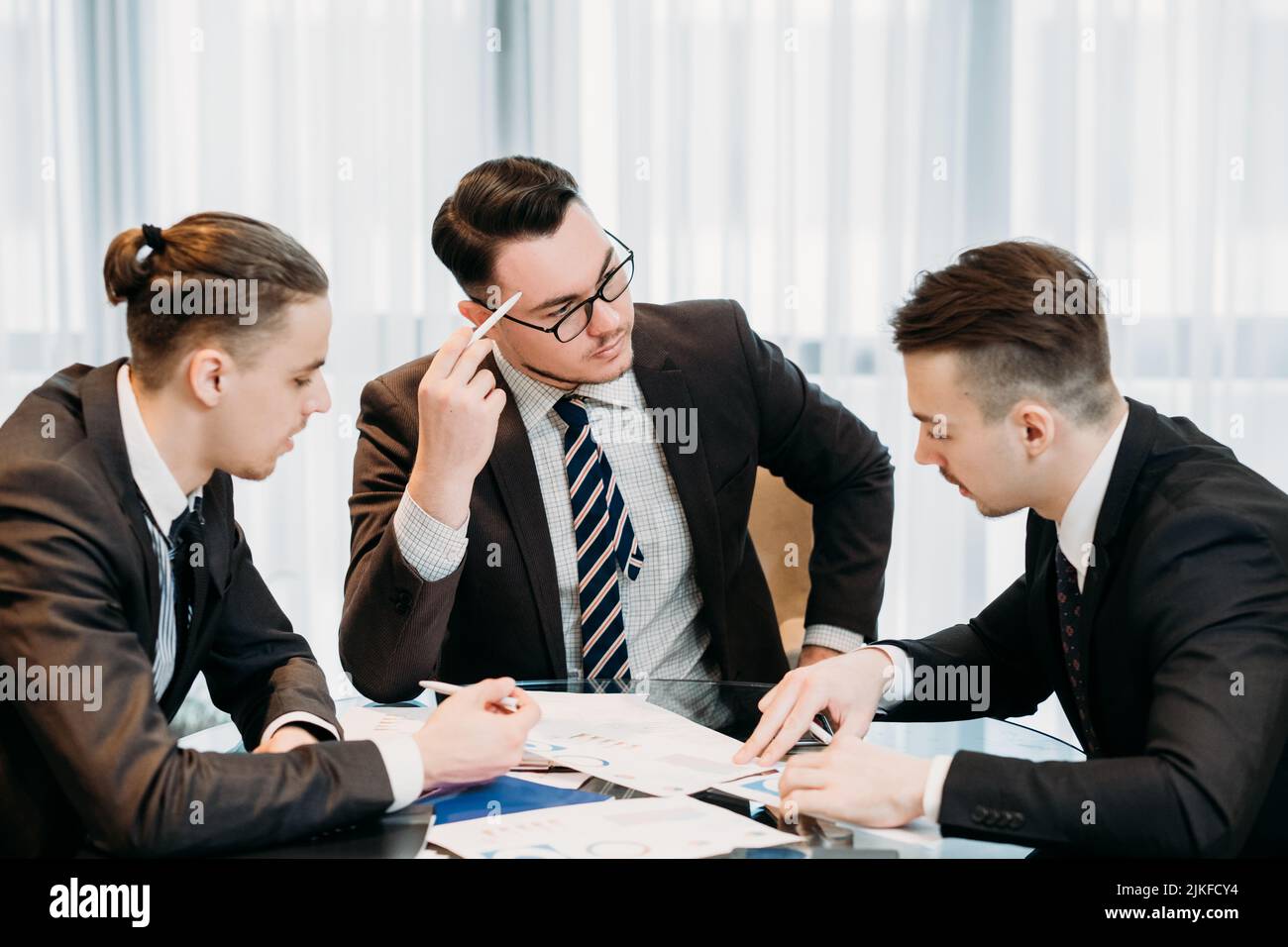 manager meeting business men information analysis Stock Photo