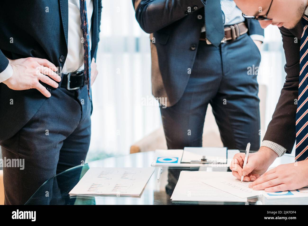 man sign contract business partner deal closing Stock Photo - Alamy