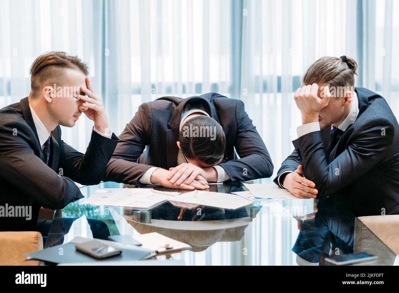 business failure bankruptcy stressed defeated team Stock Photo