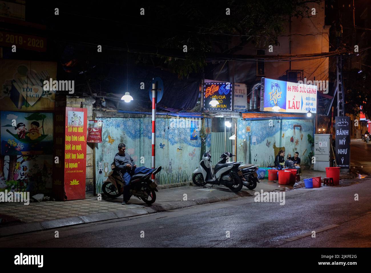 HANOI, VIETNAM - JANUARY 5, 2020: Scenes from the night streets of Hanoi, Vietnam on January 5, 2020. Stock Photo