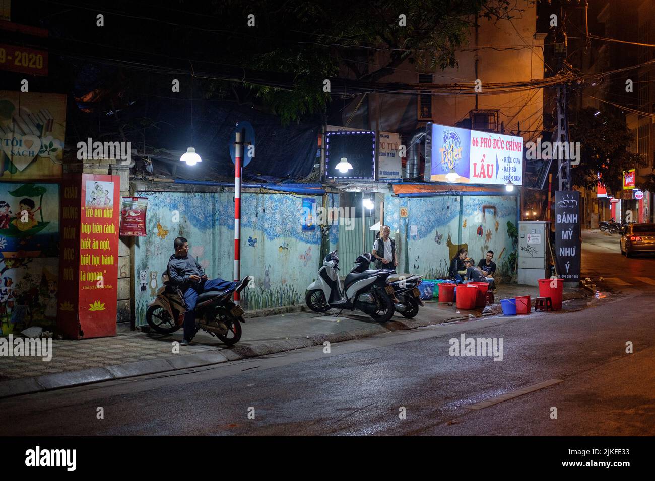 HANOI, VIETNAM - JANUARY 5, 2020: Scenes from the night streets of Hanoi, Vietnam on January 5, 2020. Stock Photo