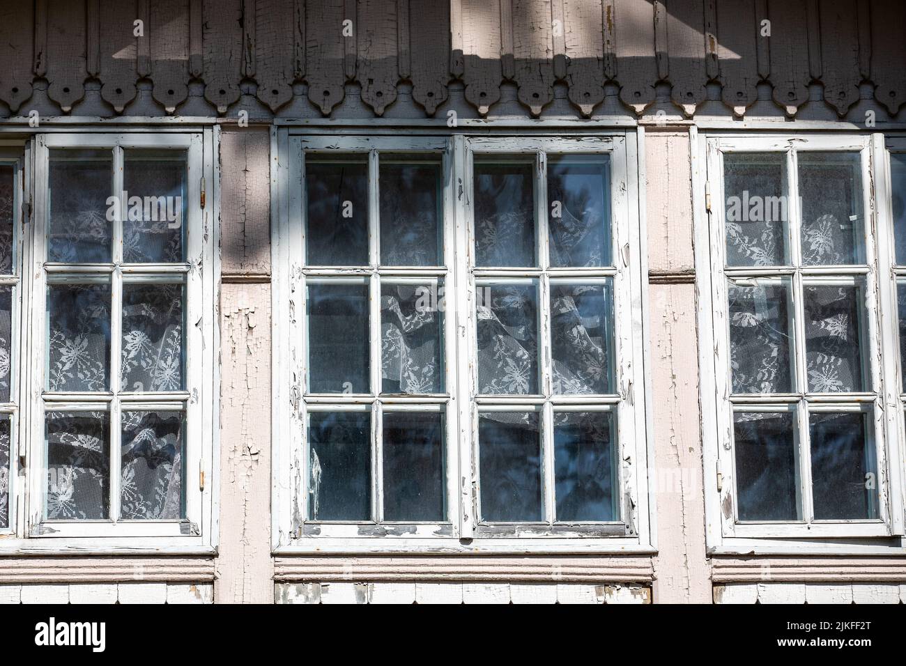 Old style wooden windows. History and architecture. Stock Photo