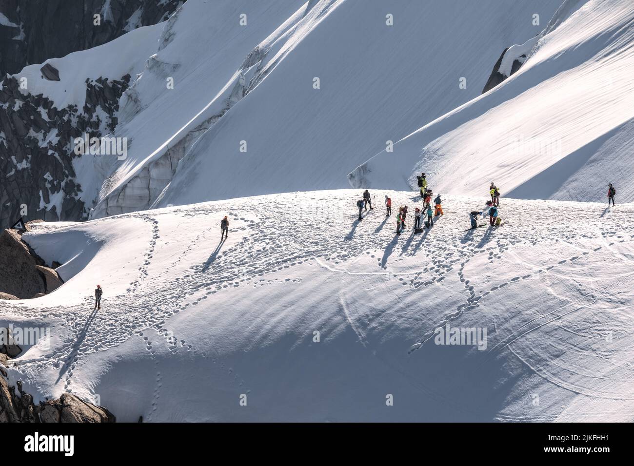 Ski climbers descending from the summit of Aiguille du Midi in Mont ...