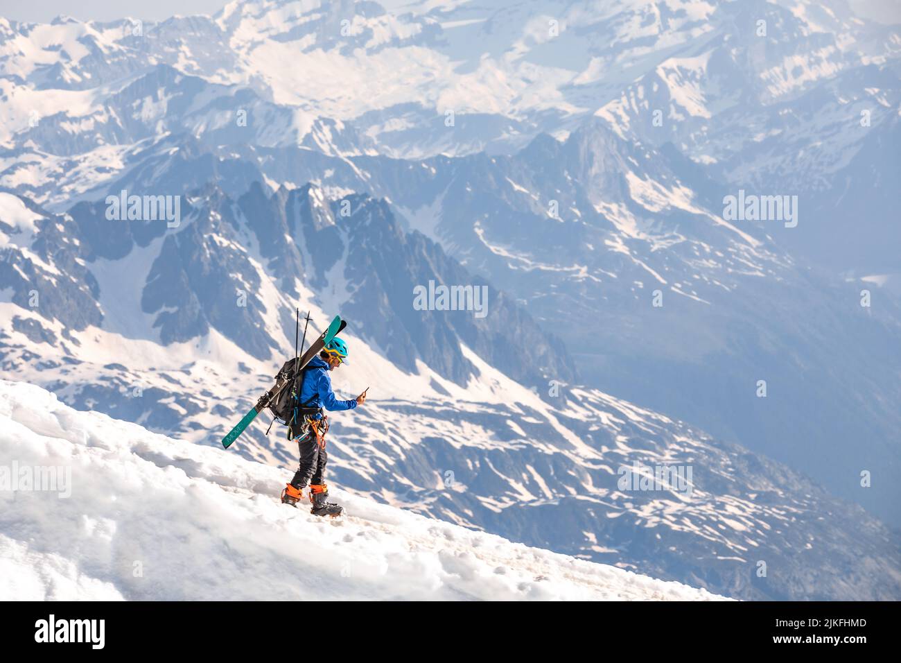 Ski climbers descending from the summit of Aiguille du Midi in Mont ...