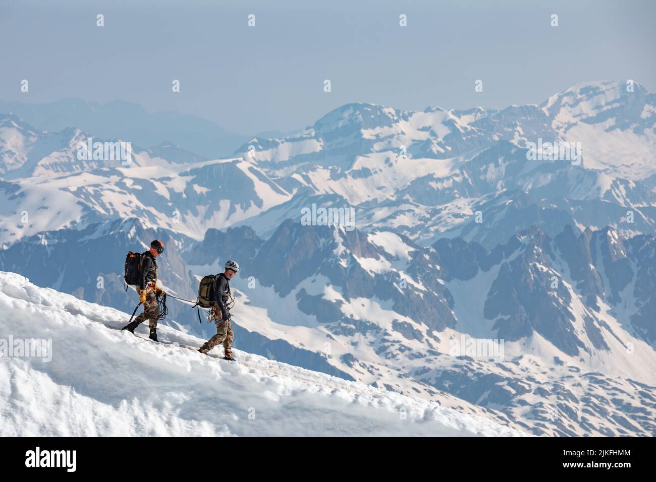 Ski climbers descending from the summit of Aiguille du Midi in Mont ...