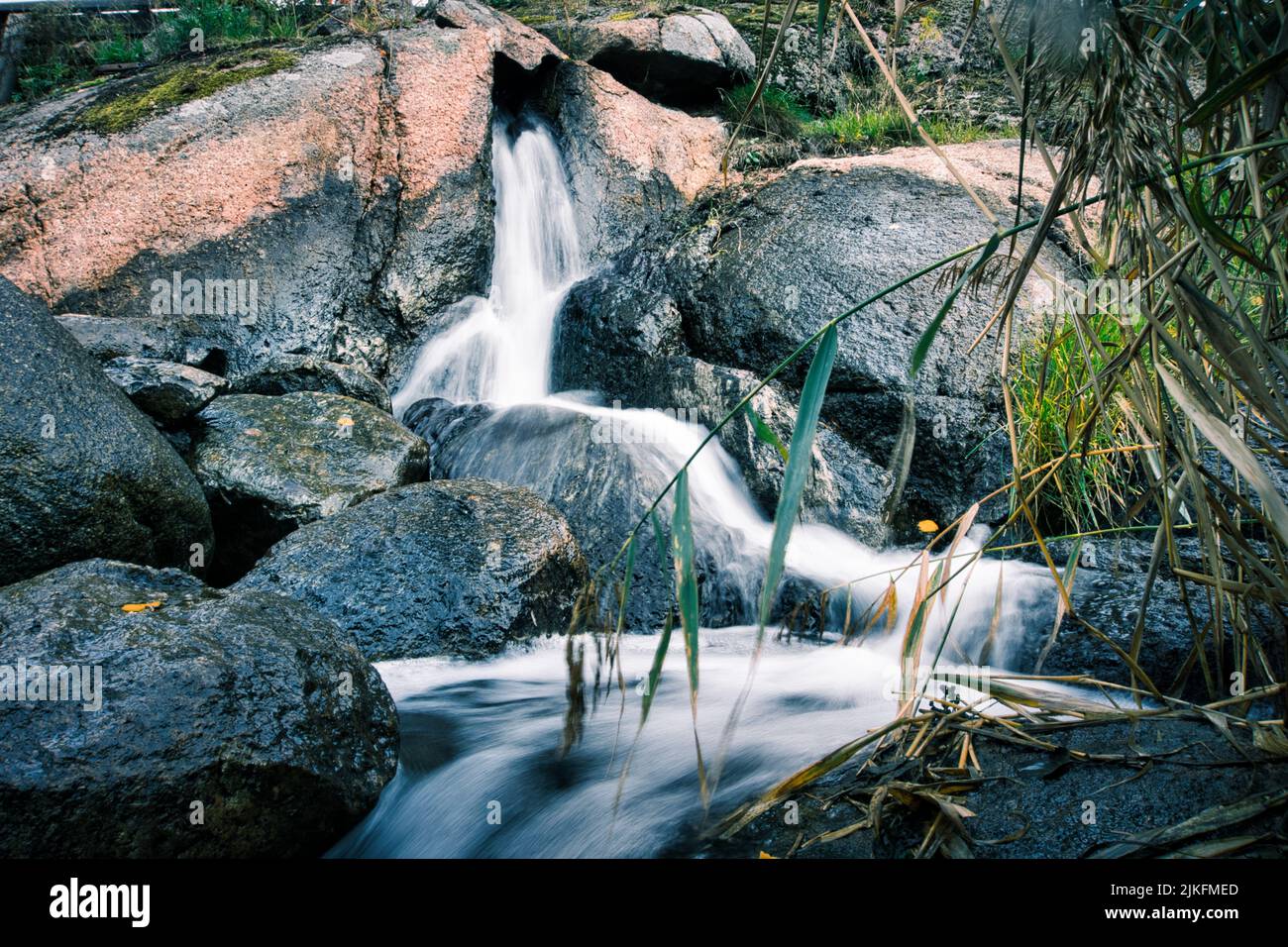 Water flowing over big stones hi-res stock photography and images - Alamy