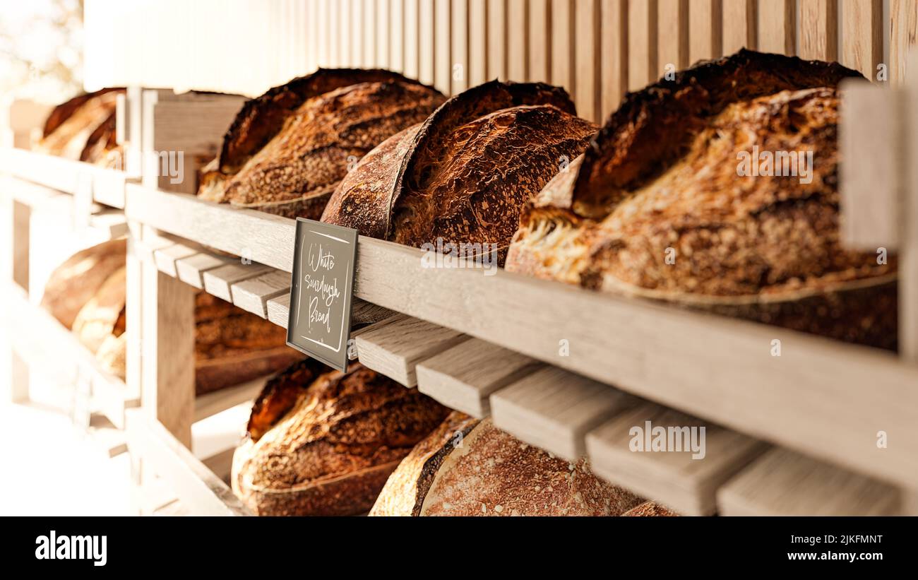 The sourdough bread lies on the shelves in the bakery store A real