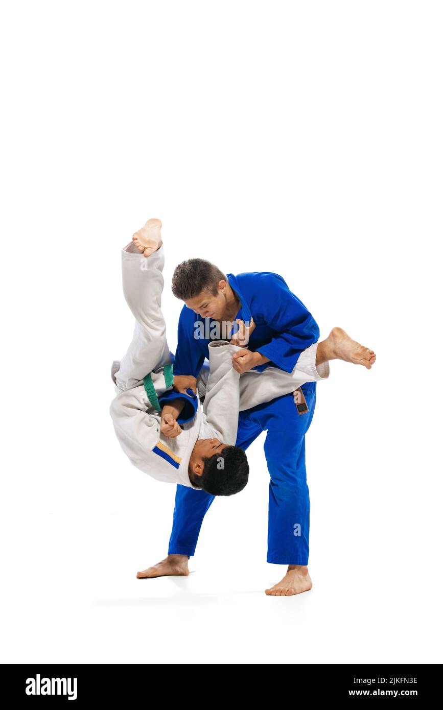 Portrait of two professional judo athletes in special uniform training