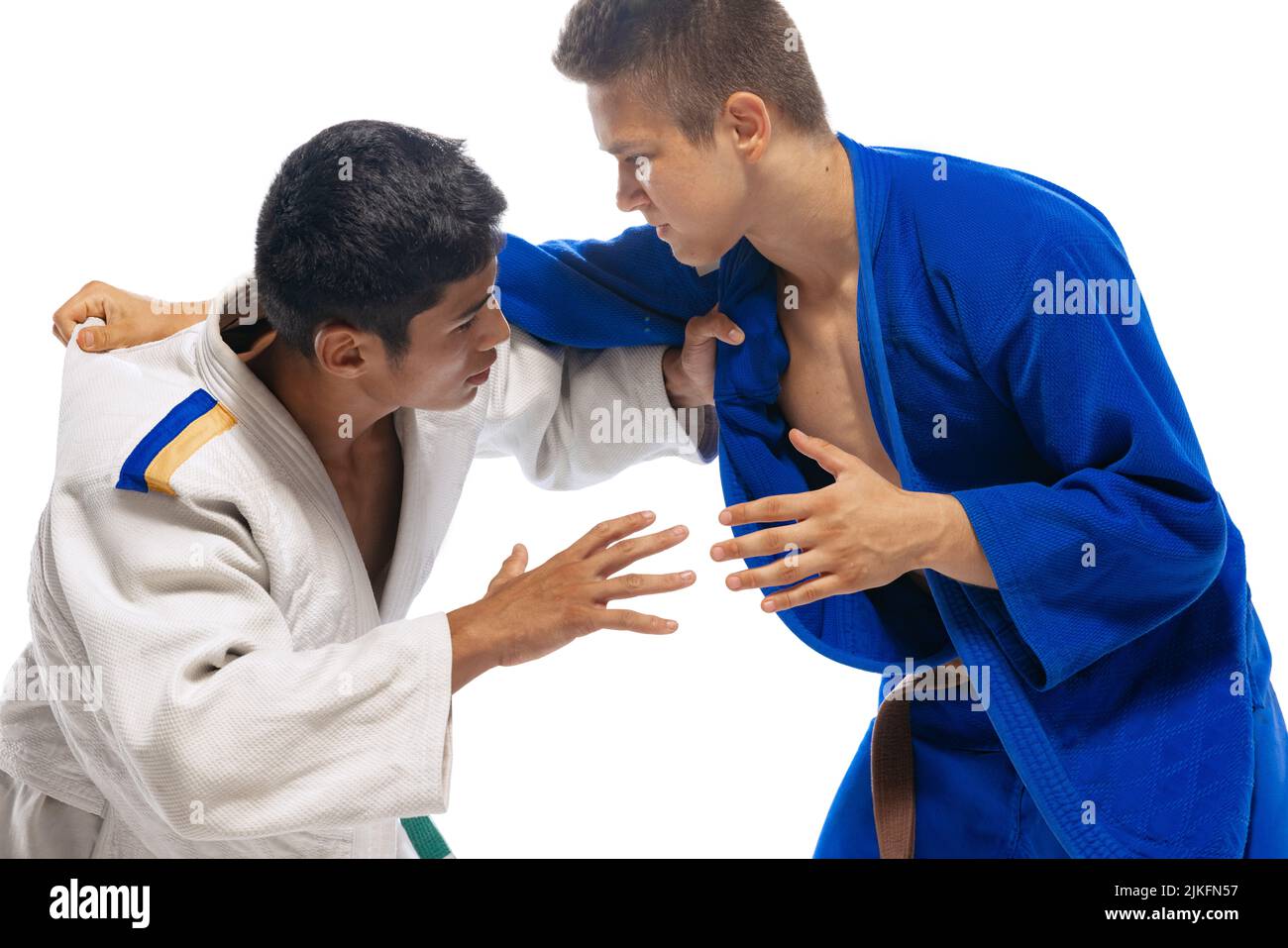 Studio shot of two men, martial arts, karate, judo athletes training