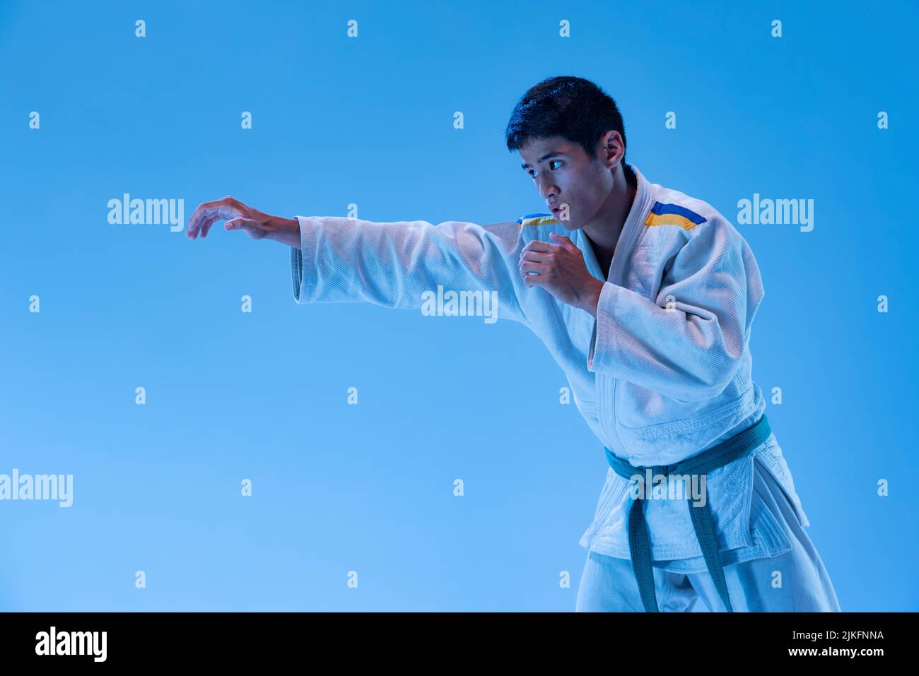 A Man, In A Black Kimono Is Practicing Martial Arts Technique With A Long  Bamboo Fighting Stick. Stock Photo, Picture and Royalty Free Image. Image  91980191.