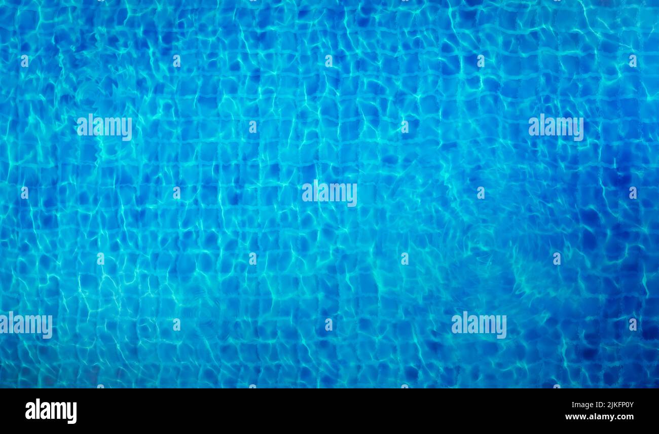 top down view of rippled clear blue water in swimming pool Stock Photo