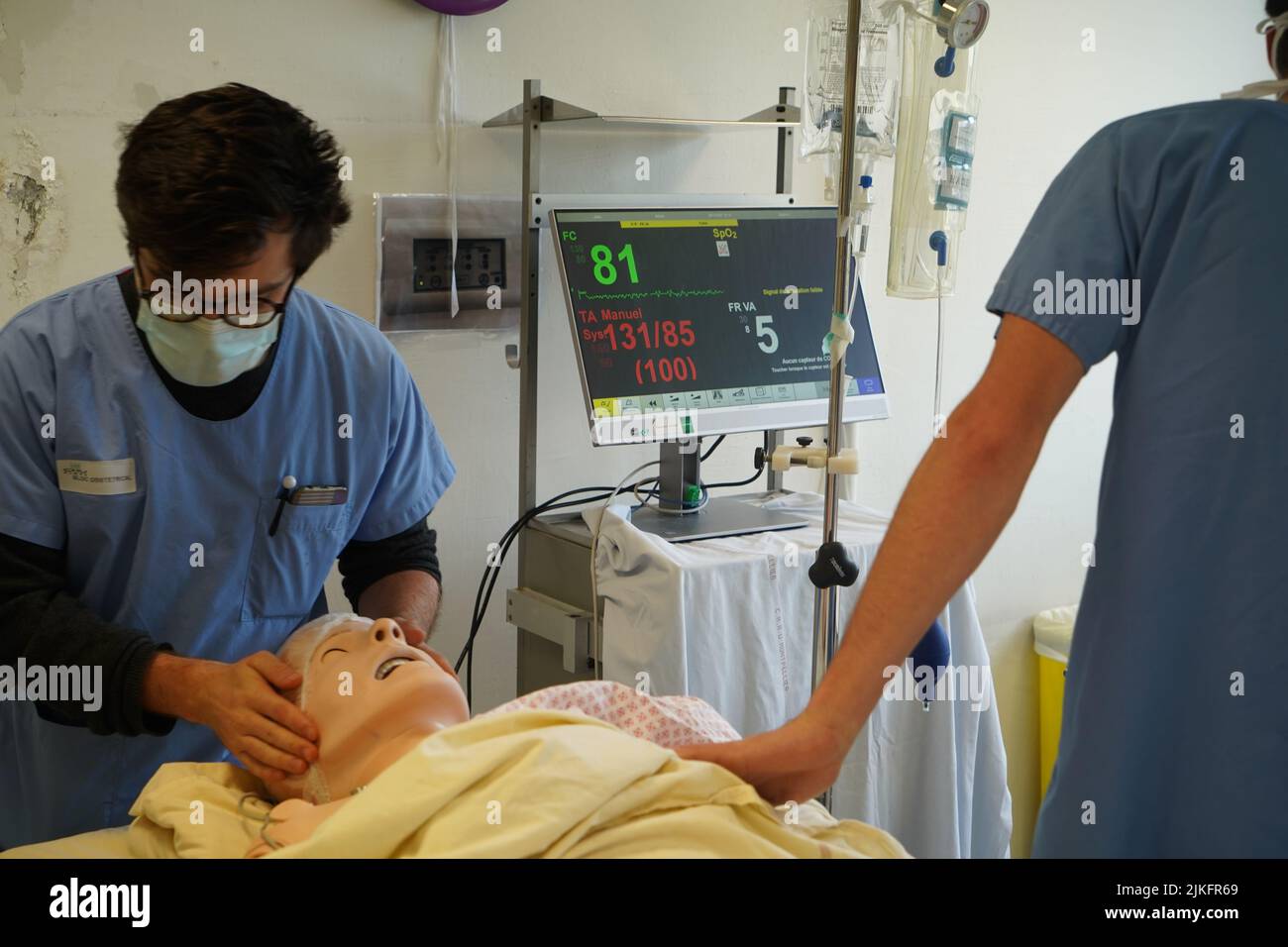 Anesthesiologist students during a critical situation resuscitation exercise at the Nimes Faculty of Medicine. Students train on a Sim Man 3 G robotic dummy. Stock Photo