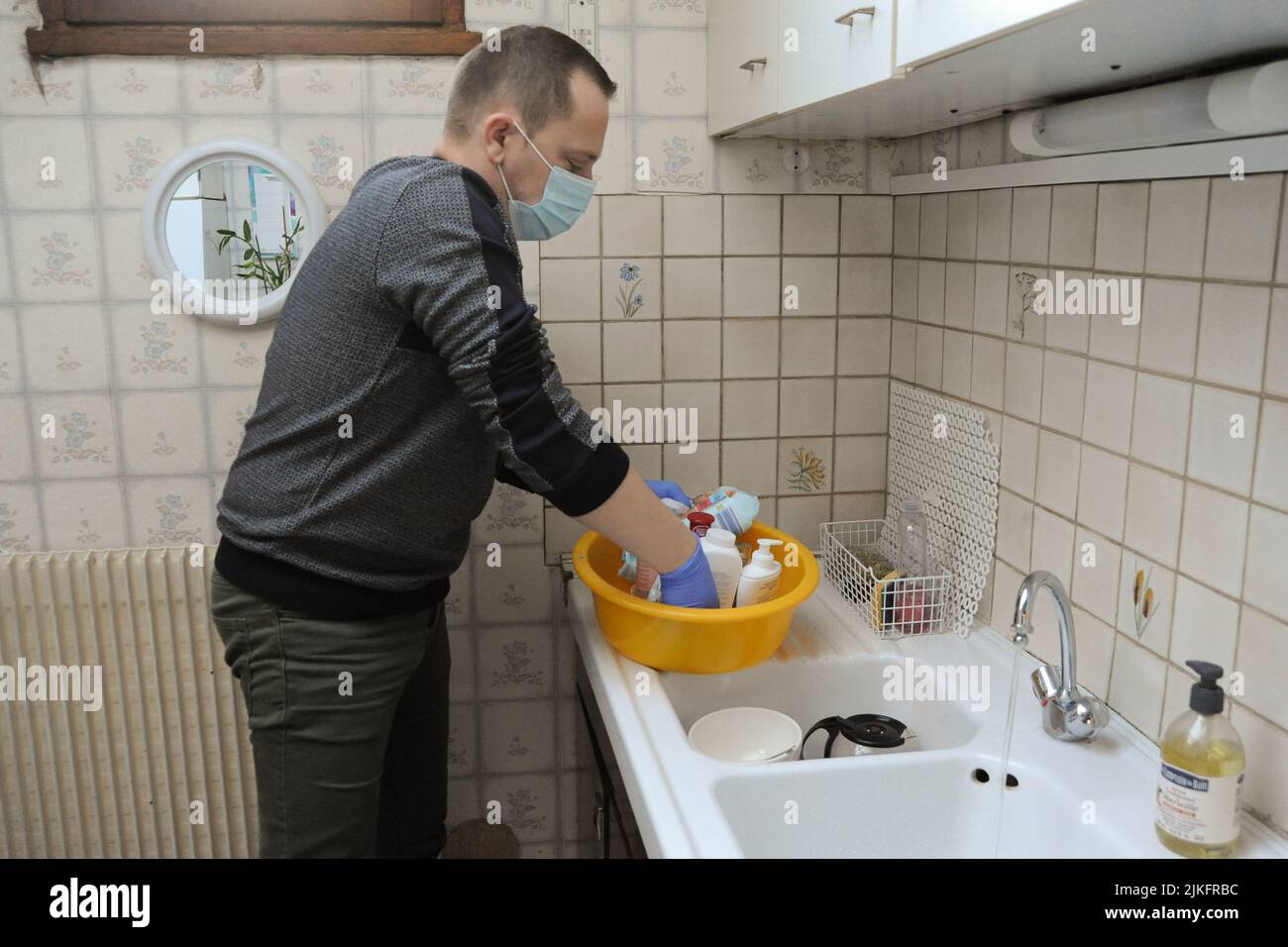 Private nurse performs a complete toilet in the home of an 86yearold