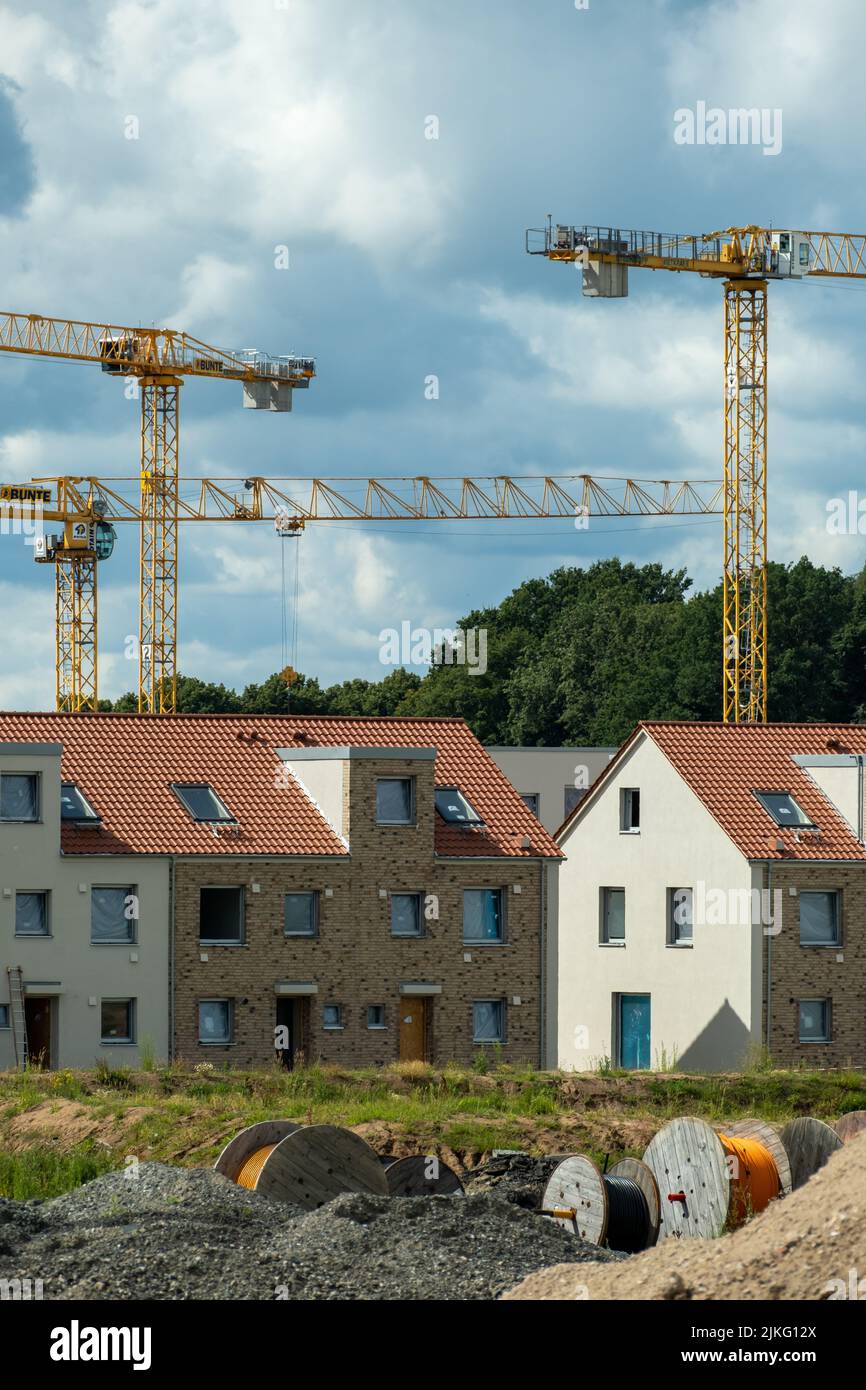 Row houses construction crane hires stock photography and images Alamy