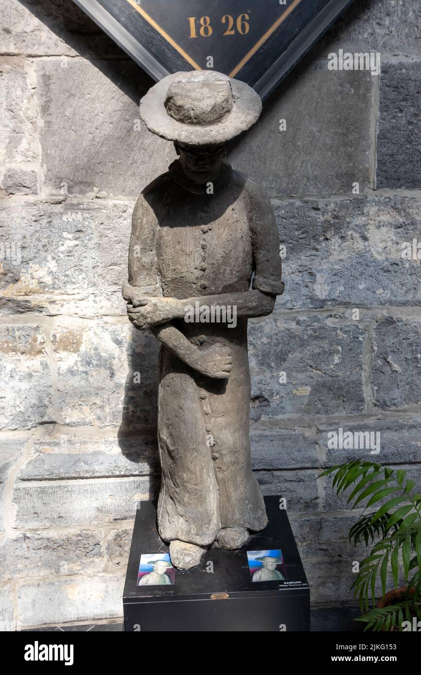 Ghent, Belgium - July 13, 2018: Cement statue of Father Damien (circa 2008) by Philippe Verschueren Stock Photo