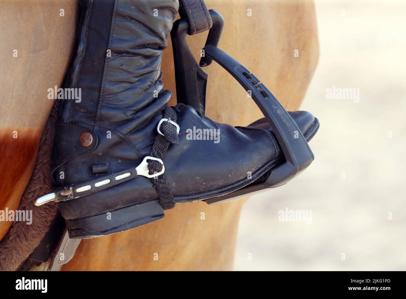 23.02.2022, Qatar, , Doha - Riding boot with spur in a stirrup ...