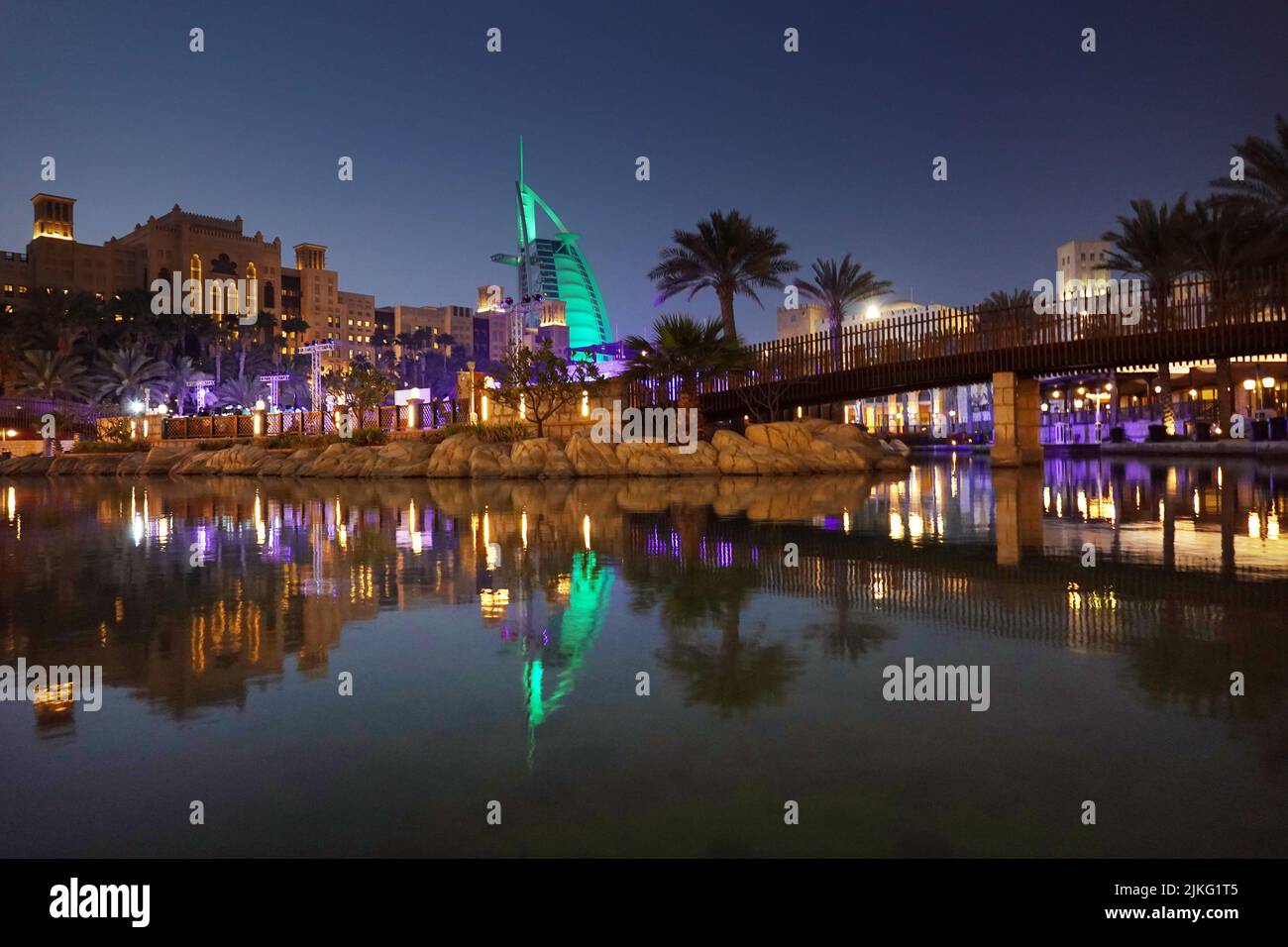 25.03.2022, United Arab Emirates, , Dubai - View of the Burj al Arab and the Madinat Jumeirah hotel at night. 00S220325D215CAROEX.JPG [MODEL RELEASE: Stock Photo