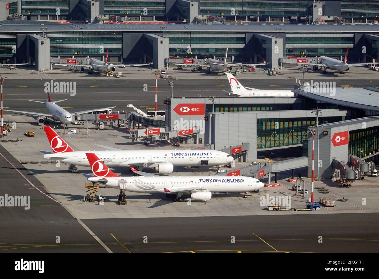 27.03.2022, Turkey, , Istanbul - Aircraft of Turkish Airlines in front of the terminal of Istanbul Airport. 00S220327D235CAROEX.JPG [MODEL RELEASE: NO Stock Photo