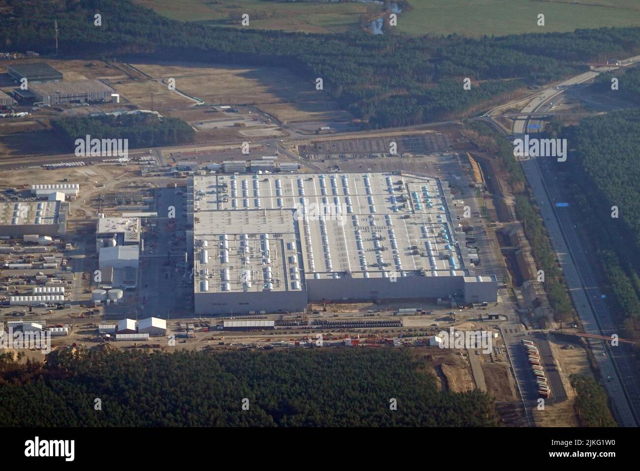 27.03.2022, Germany, Brandenburg, Gruenheide - Aerial view of the Tesla Gigafactory Berlin-Brandenburg. 00S220327D237CAROEX.JPG [MODEL RELEASE: NO, PR Stock Photo