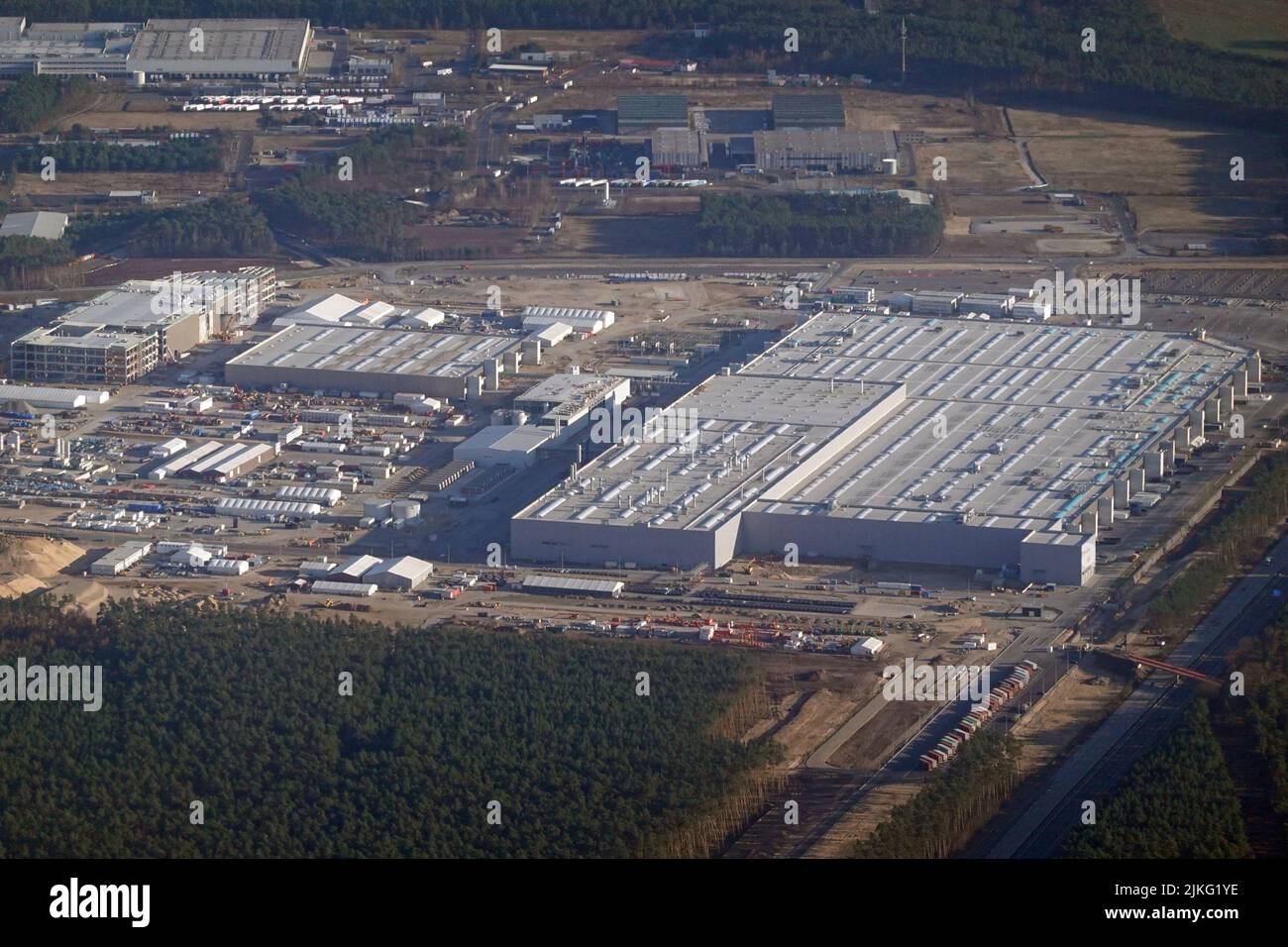 27.03.2022, Germany, Brandenburg, Gruenheide - Aerial view of the Tesla Gigafactory Berlin-Brandenburg. 00S220327D239CAROEX.JPG [MODEL RELEASE: NO, PR Stock Photo