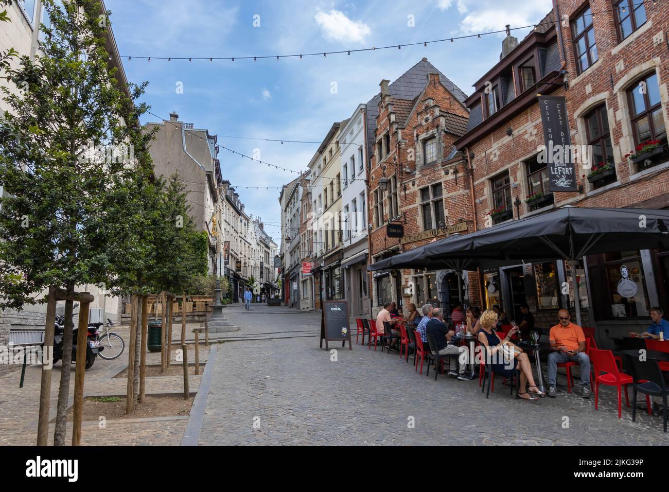 Brussels, Belgium - July 16, 2018: Rue de Rollebeek, a small street with cafes and restaurants in the downtown Stock Photo