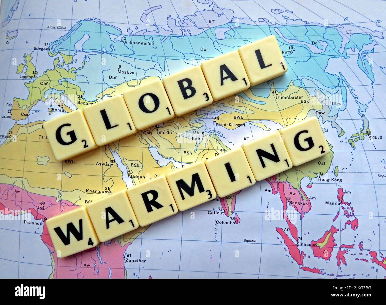 Climate Change , Global Warming spelled out in Scrabble letters on a map. Europe’s record-breaking June 2026 heatwave and heat-dome conditions. Stock Photo