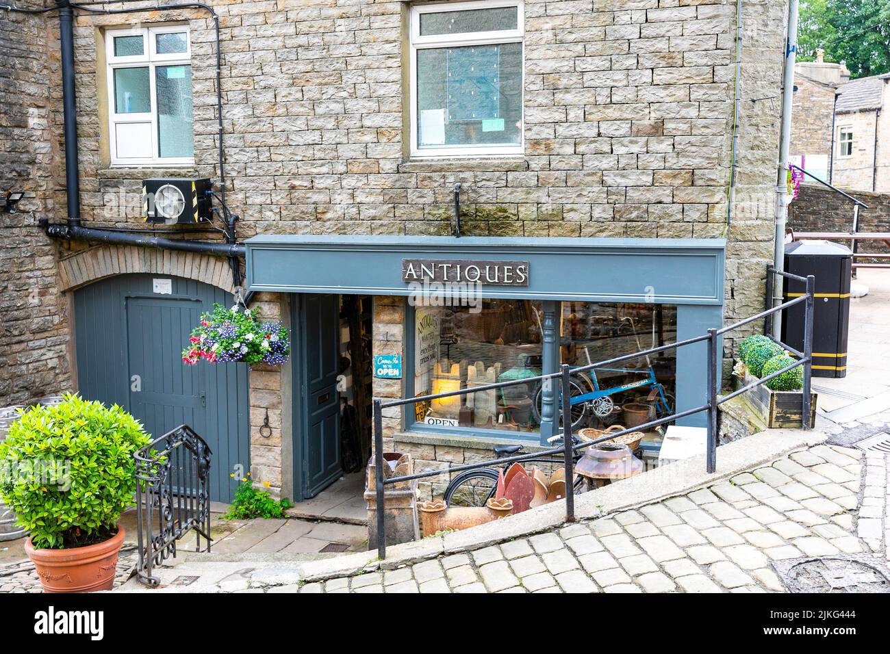 Hawes market town in Yorkshire Dales, Antiques store in the town centre, Raleigh chopper bike in shop window,Yorkshire,England,UK,Europe Stock Photo