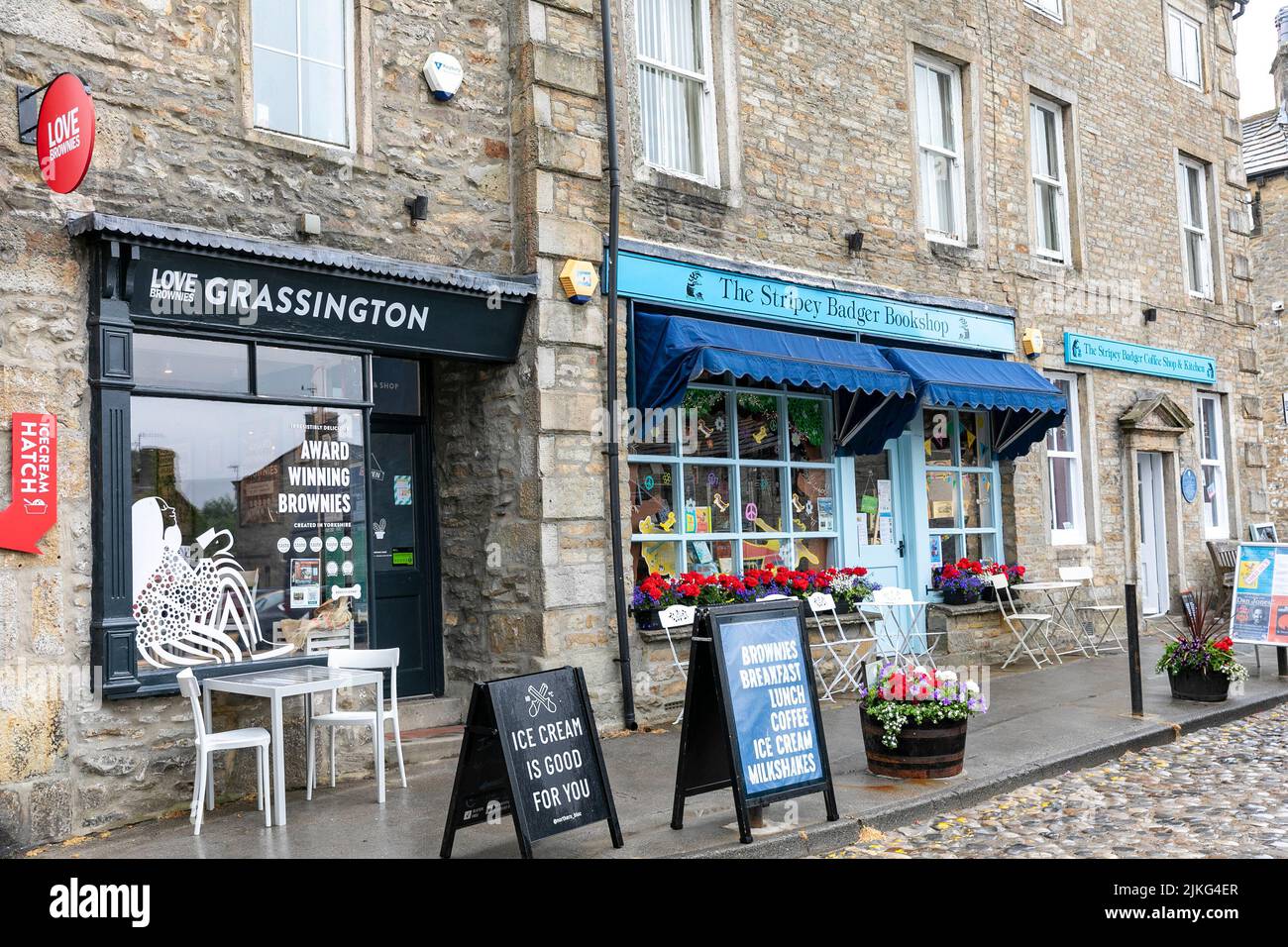 Yorkshire village of Grassington, local village shops including Grassington brownies and Stripes bagel bookshop, Yorkshire Dales,England,Uk Stock Photo