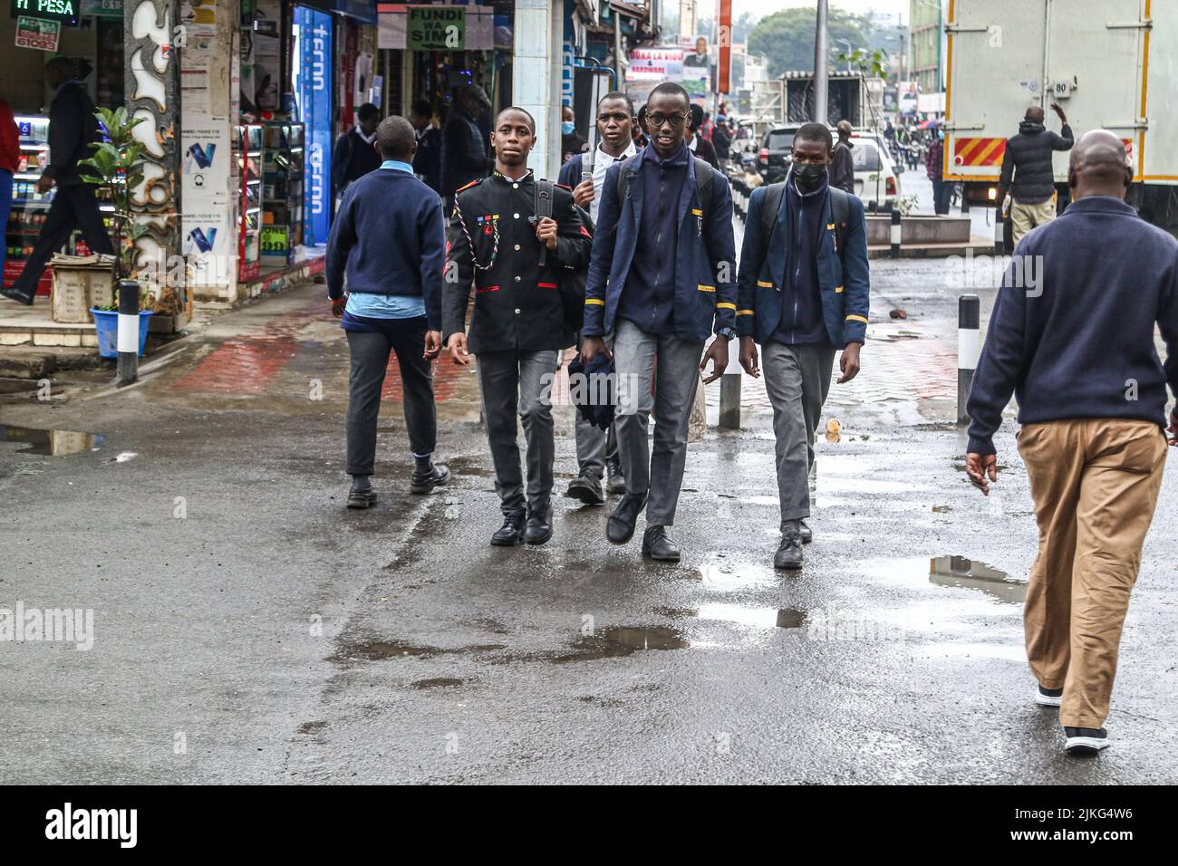 Nakuru, Kenya. 02nd Aug, 2022. Students are seen crossing a busy road. Schools have been closed in preparation for Kenya's General election to be held on August 9, 2022. Credit: SOPA Images Limited/Alamy Live News Stock Photo