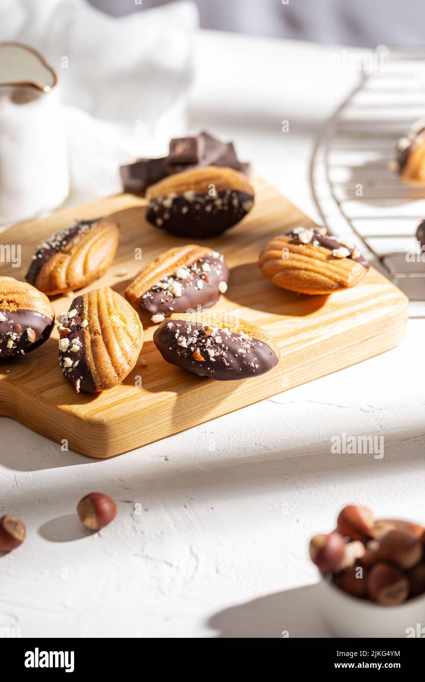 Vanilla madeleine cookies with chocolate and nuts Stock Photo Alamy
