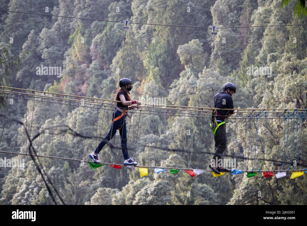 Panchpulla, Dalhousie, Himachal Pradesh, India - May 21st 2022: Tourists enjoying zip lining adventure sport Stock Photo