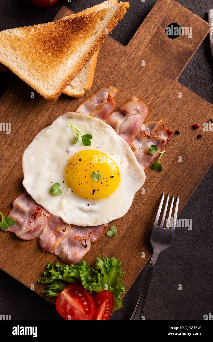 American breakfast with eggs and bacon Stock Photo